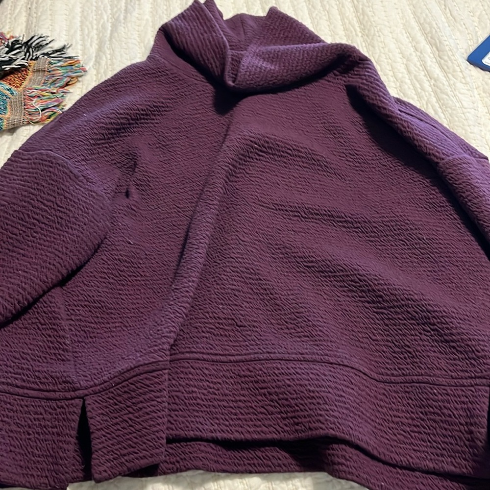 Turtle neck sweater.